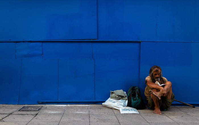 Homeless Man Blue Wall